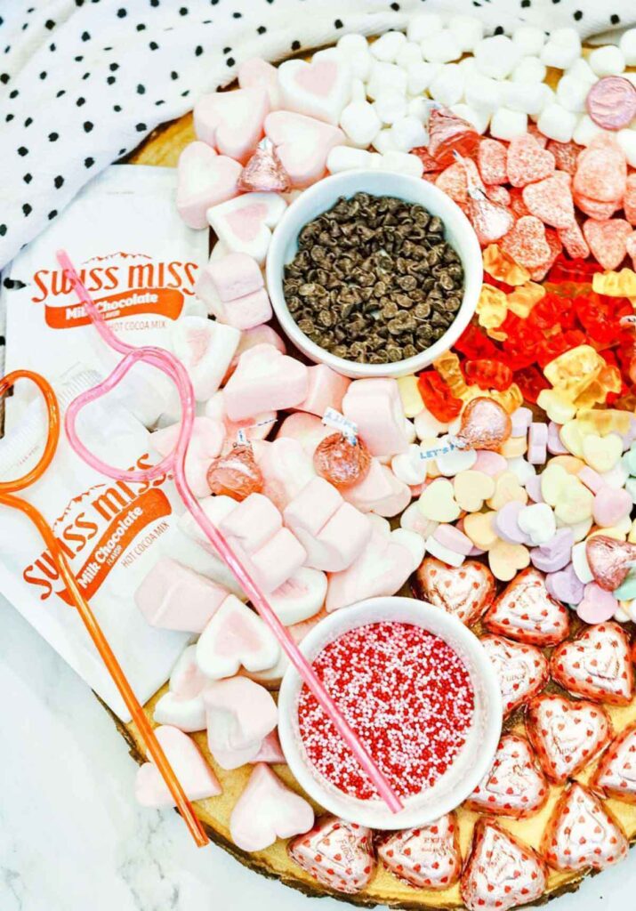 Valentine’s Day Candy and Hot Chocolate Board by Two Kids and a Coupon - 20 Valentine Charcuterie Boards: Ideas and Inspiration