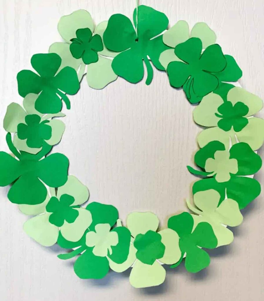 shamrock wreaths with paper cutouts.