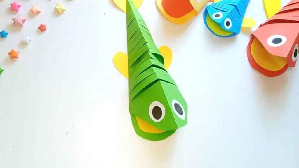 green Flexible Paper Fish on table by Crafts and Printables