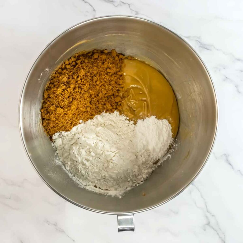 stand up mixer bowl with ingredients for cake batter inside
