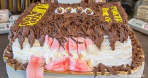 finished monster book of monsters cake on table - Press Print