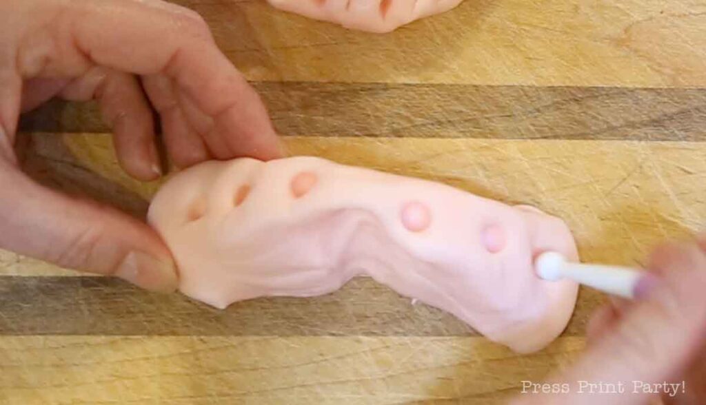 bottom gums for the monster book of monsters cake on table - Press Print
