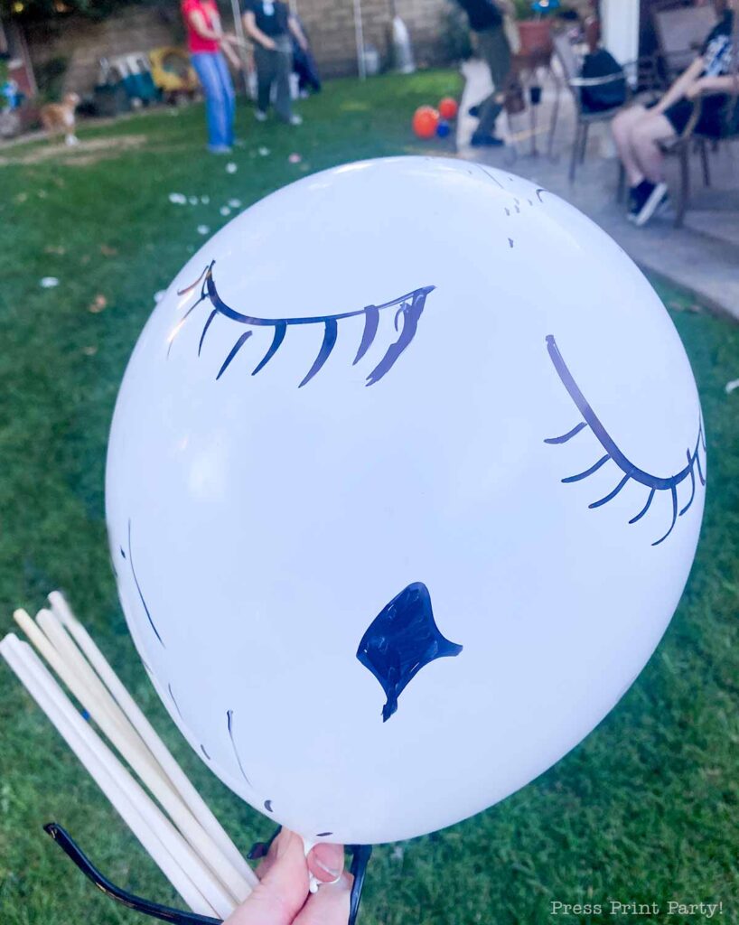 owl face on a balloon for harry potter party games