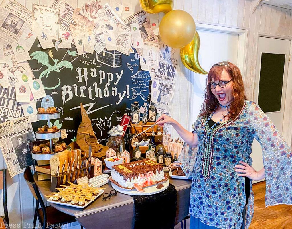 nathalie Brown from press print party in front of a harry potter dessert table