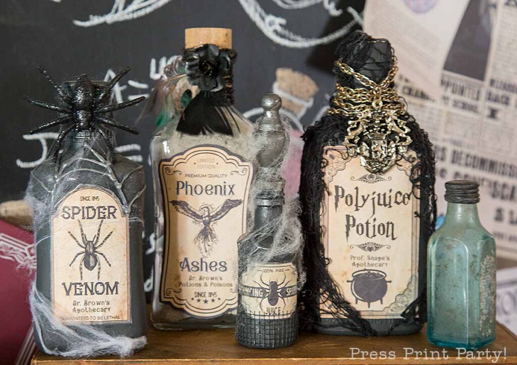 harry potter potion bottle on table at harry potter birthday party. polyjuice potion spider venom, phoenix ashes