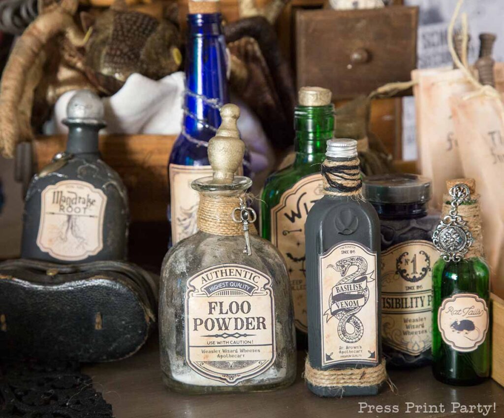 harry potter potion bottle on table at harry potter birthday party. floo powder, basilisk venom, rat tails, mandrake root