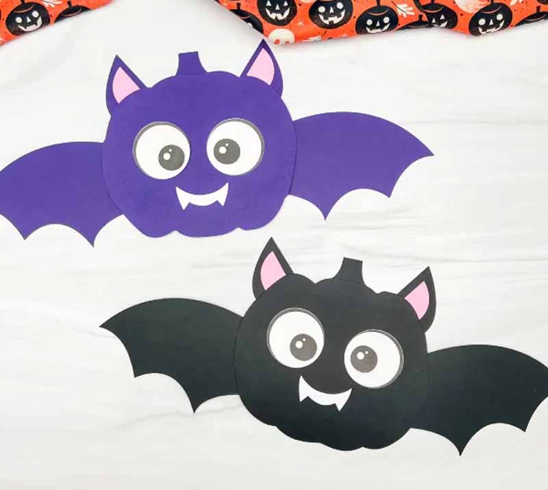 a paper bats with eyes and mouth