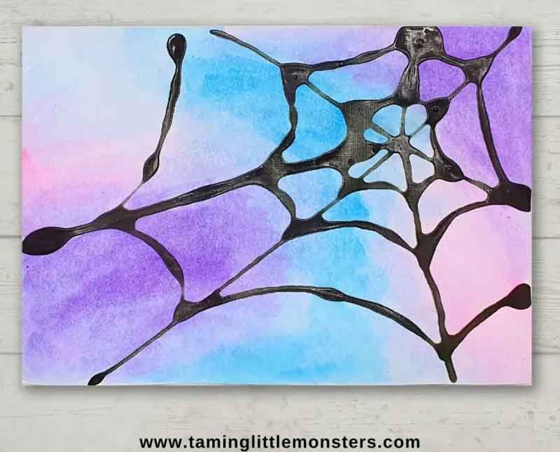 spider web art with glue and paint