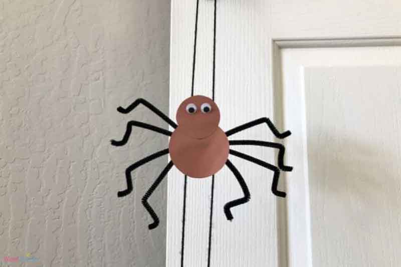 climbing spider made with cardstock and pipe cleaners