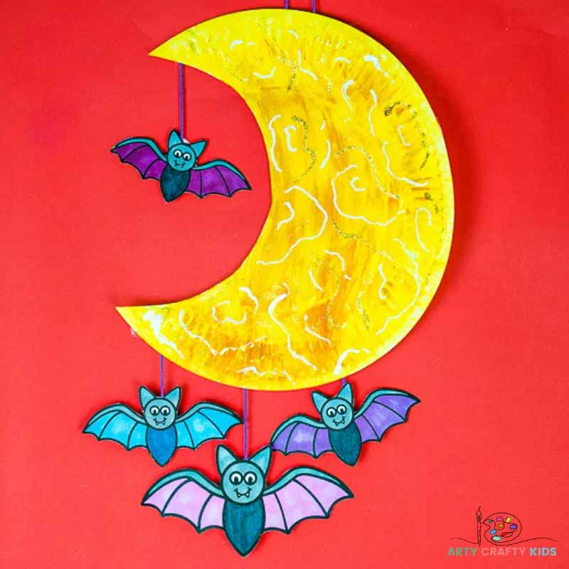 bat mobile with a moon and 4 bats