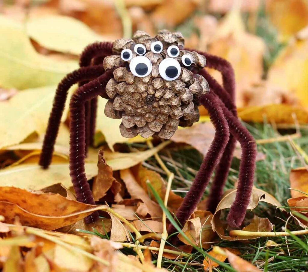 pine cone spider craft with googly eyes