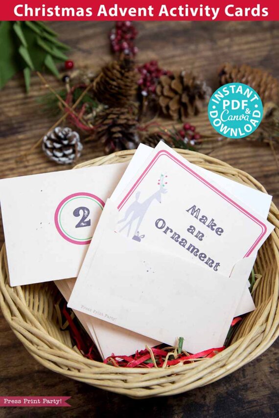 A wicker basket overflowing with Advent Calendar Cards Printable Rustic Christmas Countdown sits on a wooden table, adorned with pinecones and festive decorations. One card, partially visible, reads "Make an Ornament," and a blue label assures an instant PDF download.