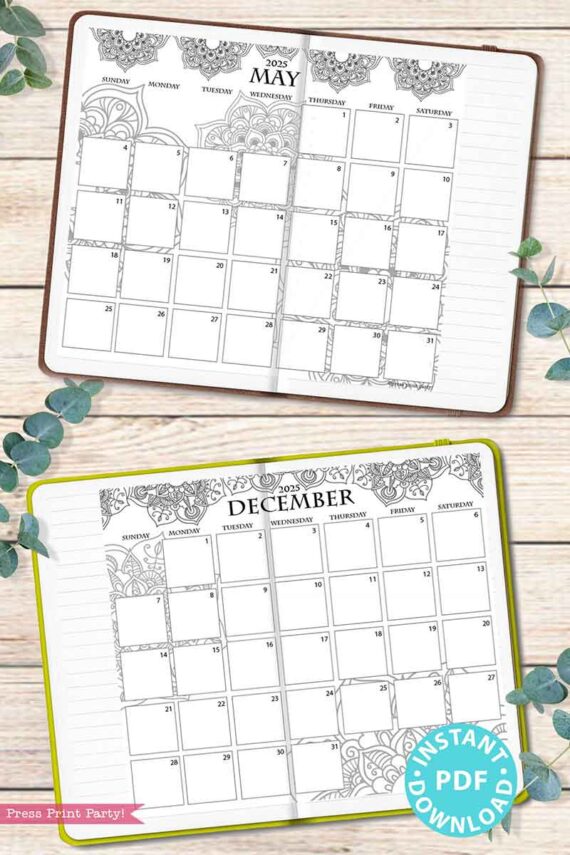 A stylish 2025 monthly planner showcases ornate floral designs at the top of its May and December pages. Placed on a wooden surface surrounded by green leaves, this elegant planner also features a preview of the 2025 One Page Calendar at-a-glance Printable Mandala. A circular "Instant PDF Download" label is elegantly placed in the bottom corner.