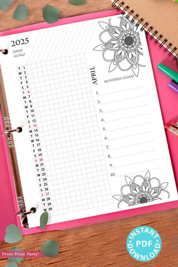 A 2025 One Page Calendar at-a-glance Printable Mandala open to April showcases a single-page calendar highlighted with red-emphasized weekends amidst floral designs. The monthly goals section is designed to inspire creativity, adorned with leaves and vibrant markers, accompanied by a sticker that reads "Instant PDF Download.