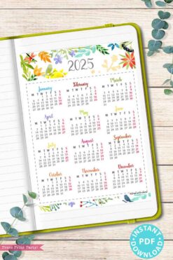 A 2025 calendar from the "2025 Calendar Bundle for Bullet Journals or Binders, Watercolor" is displayed in a notebook, featuring a floral watercolor design at the top. It neatly lists each month in rows along with their corresponding days of the week. Decoratively labeled as an instant PDF download, it beautifully complements its 2025 calendar printable counterpart.
