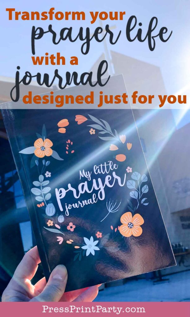 A person holds up a "My Little Prayer Journal" with a floral design on the cover against a clear blue sky. Text reads: "Transform your prayer life with a journal designed just for you.