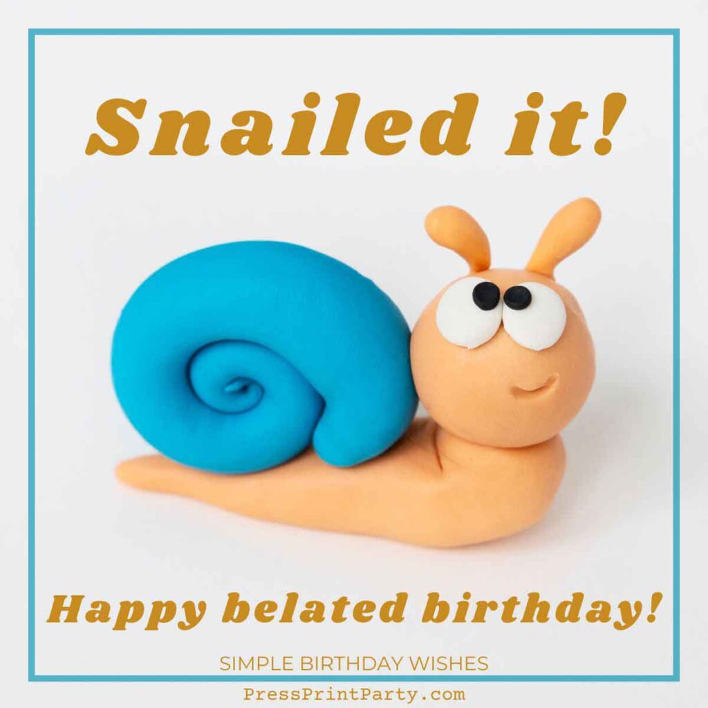 A cartoon snail made of clay with a blue shell and a smiling face cheerfully conveys simple birthday wishes. The text above reads "Snailed it!" while below, it says "Happy belated birthday!" on a white background.