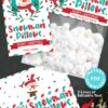 Introducing the Mrs. Claus Bakery Christmas Treat Bag Topper & Tag, featuring festive snowman-themed designs labeled "Snowman Pillows." The package includes a PDF with editable text options for personalized Christmas greetings, adorned with decorative elements such as holly, candy canes, and marshmallows.