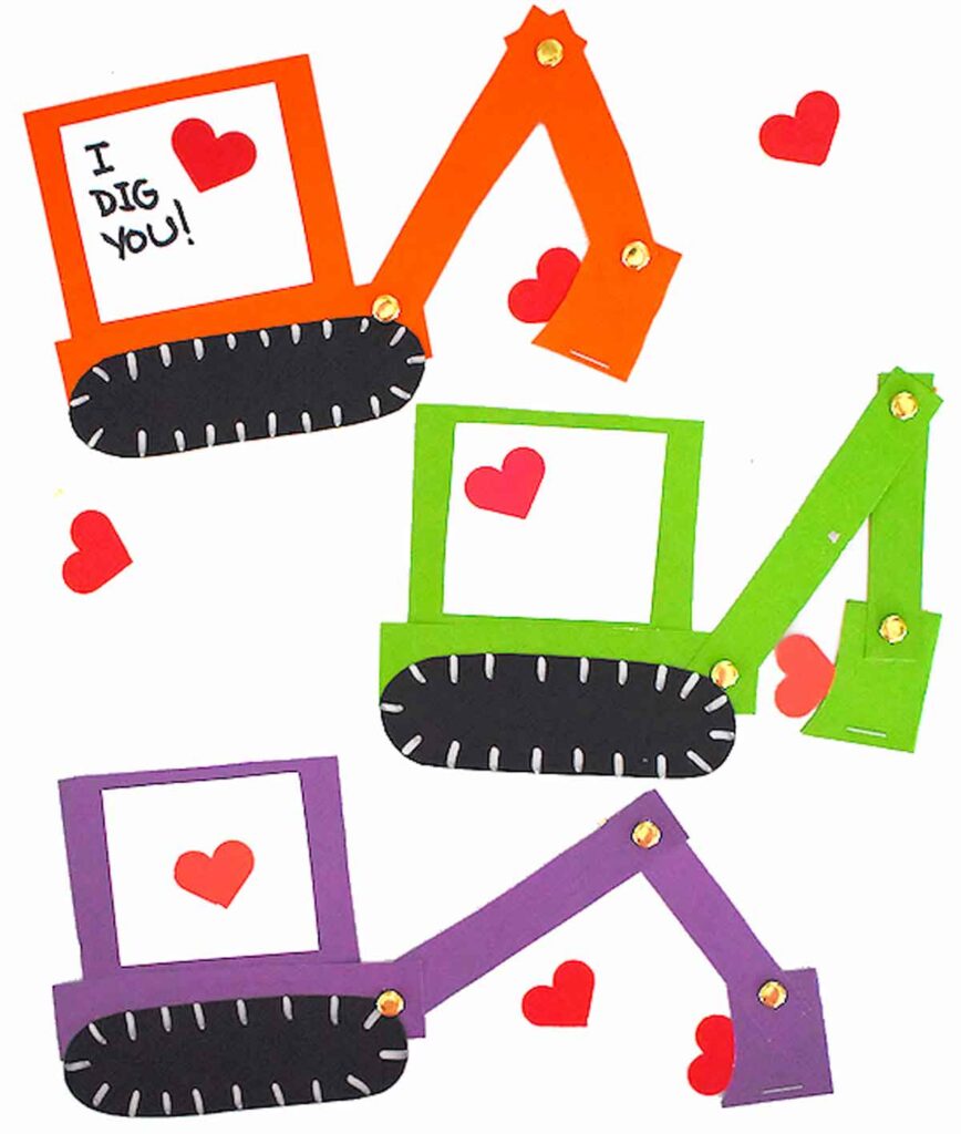 Colorful paper cutouts of diggers in orange, green, and purple with heart shapes scattered around. The orange digger has "I DIG YOU!" written on it. Each digger has a heart in its bucket.
