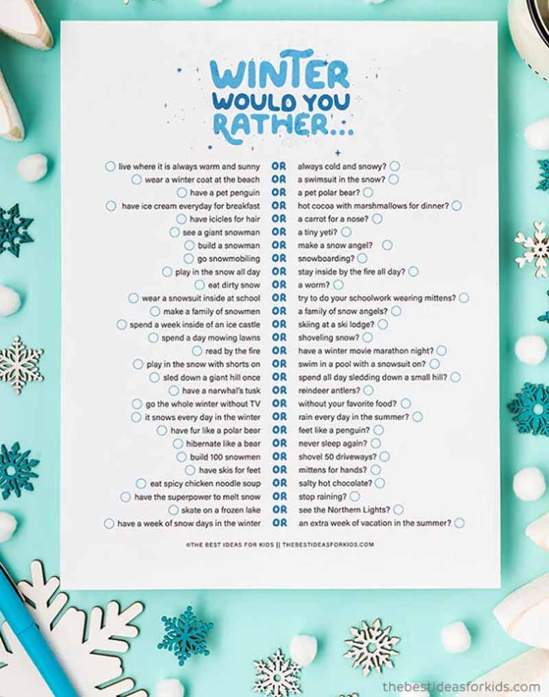 An overhead view of a "Winter Would You Rather?" printable winter game on a teal background, surrounded by snowflake decorations. The sheet contains various winter-themed questions for kids, each with two options to choose from.