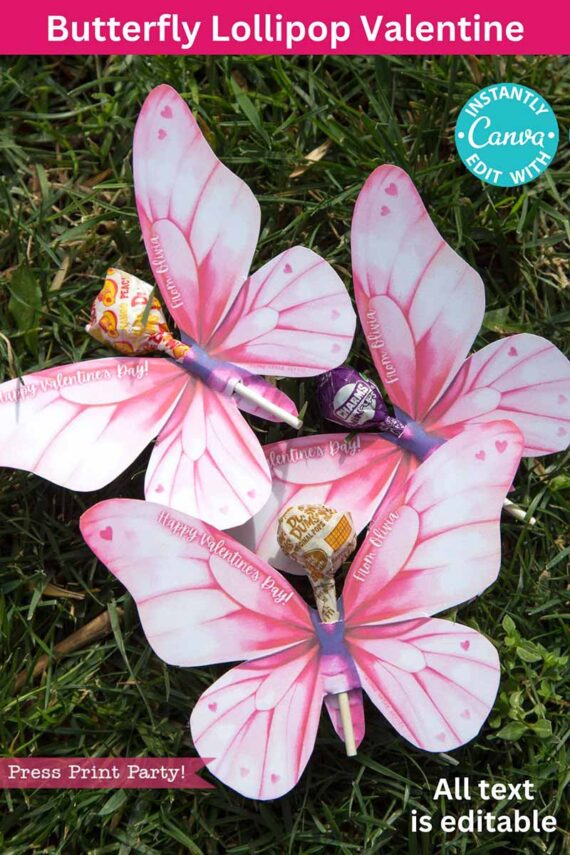 Three butterfly-shaped paper cutouts in pink, holding lollipops at their centers, rest on grass. The top reads "Butterfly Lollipop Valentine" with a Canva tag, while the bottom notes that text is editable. Product: template (Copy) (Copy).