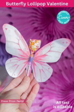 A hand holds a butterfly-shaped card with pink and white wings, wrapped around a colorful lollipop, labeled "template (Copy) (Copy)." The background features more pink decor, and text indicating the design can be edited using Canva.