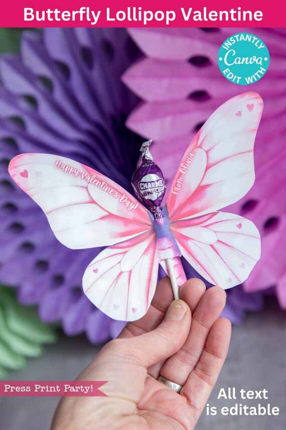 A hand displays a butterfly-shaped Valentine, crafted from a lollipop with pink and white wings. The image text reads "Butterfly Lollipop Valentine," "Editable Text," and "Instant Canva Editing." Product: template (Copy) (Copy).