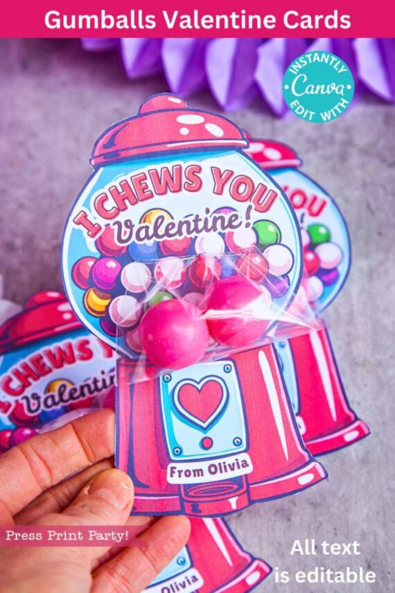 A hand holds a colorful Valentine's card shaped like a gumball machine with pink gumballs, reading "I Chews You Valentine!" and signed "From Olivia." Similar cards are seen in the background. Product Name: template (Copy) (Copy).