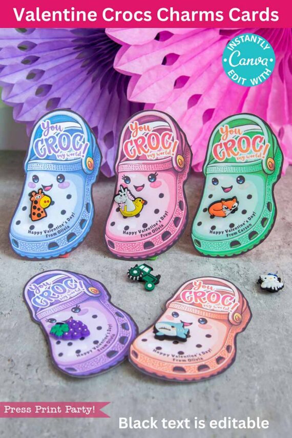 Five Valentine-themed Crocs charm cards showcase animal prints and puns on a textured surface, with each card featuring unique designs and charms. Colorful decorations adorn the background, accompanied by text: "You Croc!.