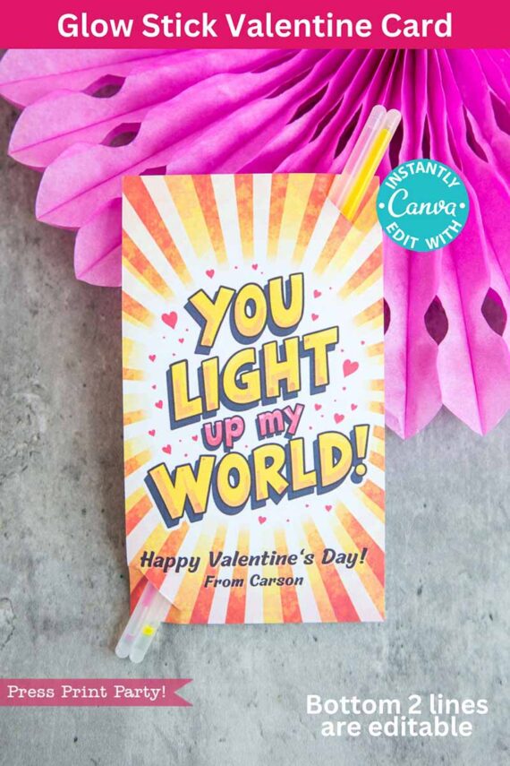 Comic-style Valentine card featuring a sunburst and hearts background with the text, "You light up my world! Happy Valentine's Day! From Carson." Includes glow stick, pink decorative paper backdrop, and editable lines at the bottom. Canva logo in the corner. Product: template (Copy) (Copy).