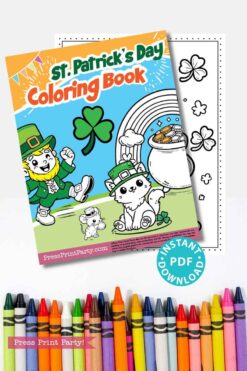 St. Patrick's Day coloring book cover featuring a leprechaun, a dog, a rainbow, and a pot of gold. A page with outlined images of a hat, clovers, and a rainbow is behind it. Colorful crayons are lined up at the bottom.