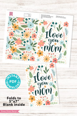 The Floral Mothers Day Card - Whimsy features "I love you mom" in bold with colorful flowers, shown folded and unfolded. Folds to 5''x7'', blank inside. Instant PDF download for easy printing.
