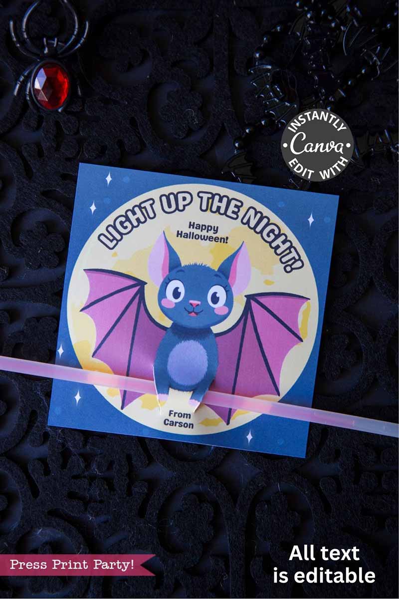 The Cute Ghost Halloween Gift Card Holder (Copy) is a square card with a cartoon bat, pink wings, stars, and "Light Up The Night! Happy Halloween." It holds a glow stick and gift card, and all text is editable. Perfect for Halloween gifting!.