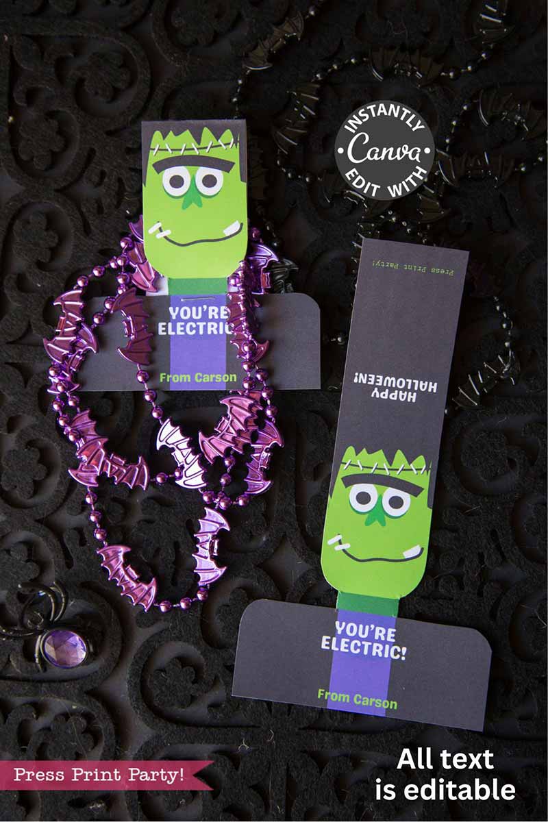 The Cute Ghost Halloween Gift Card Holder features two Frankenstein-themed Halloween cards with "YOU'RE ELECTRIC! From Carson" and "HAPPY HALLOWEEN!" plus purple beaded necklaces on a black patterned background.