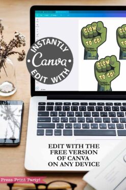A laptop on a desk shows the Cute Ghost Halloween Gift Card Holder design in Canva. Text says “Instantly edit with Canva. Edit with Canva’s free version on any device.” A glass vase and notepad sit nearby.