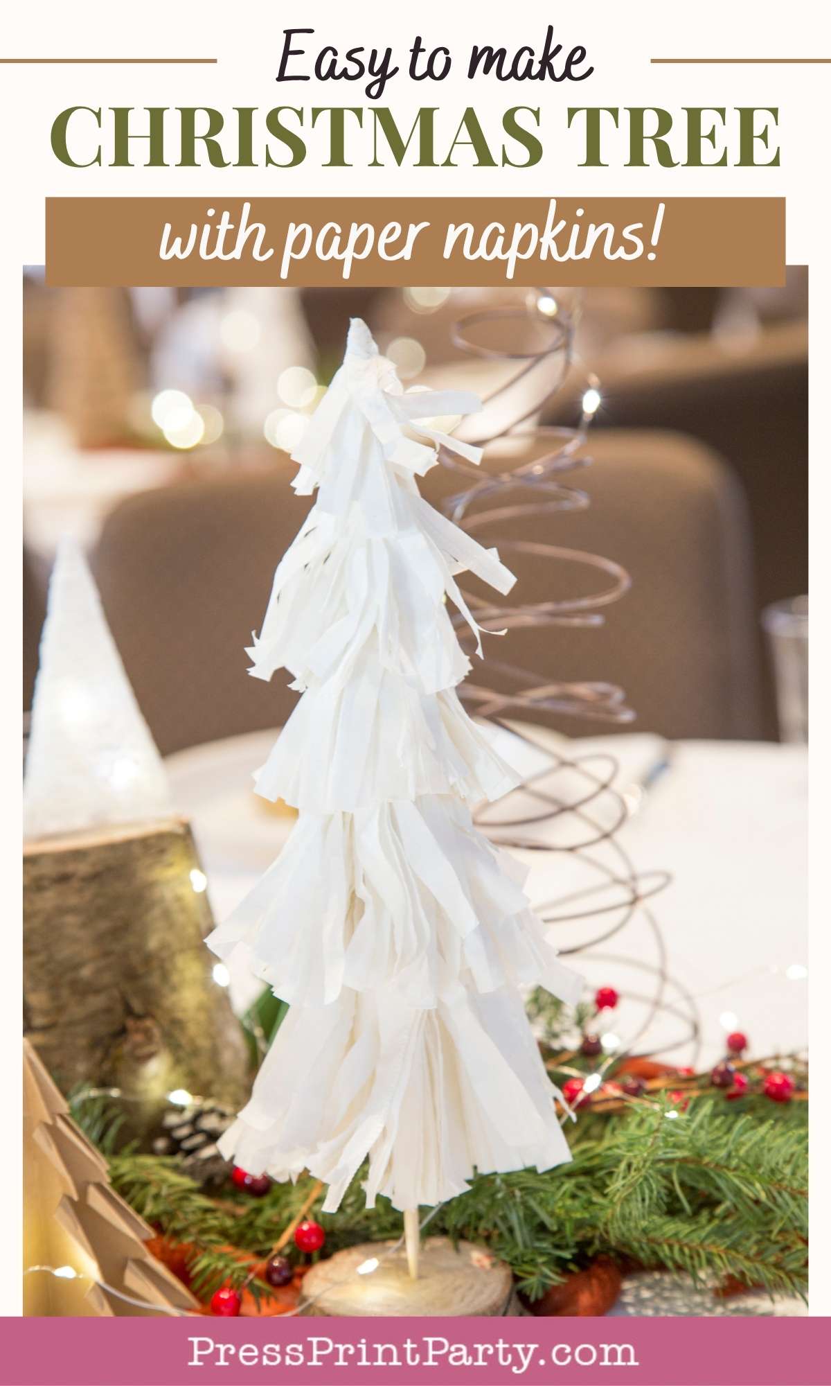 A DIY christmas tree table decor centerpiece made from white paper napkins sits on a table decorated with greenery, red berries, and holiday accents. Text above reads: "Easy to make Christmas tree with paper napkins!.