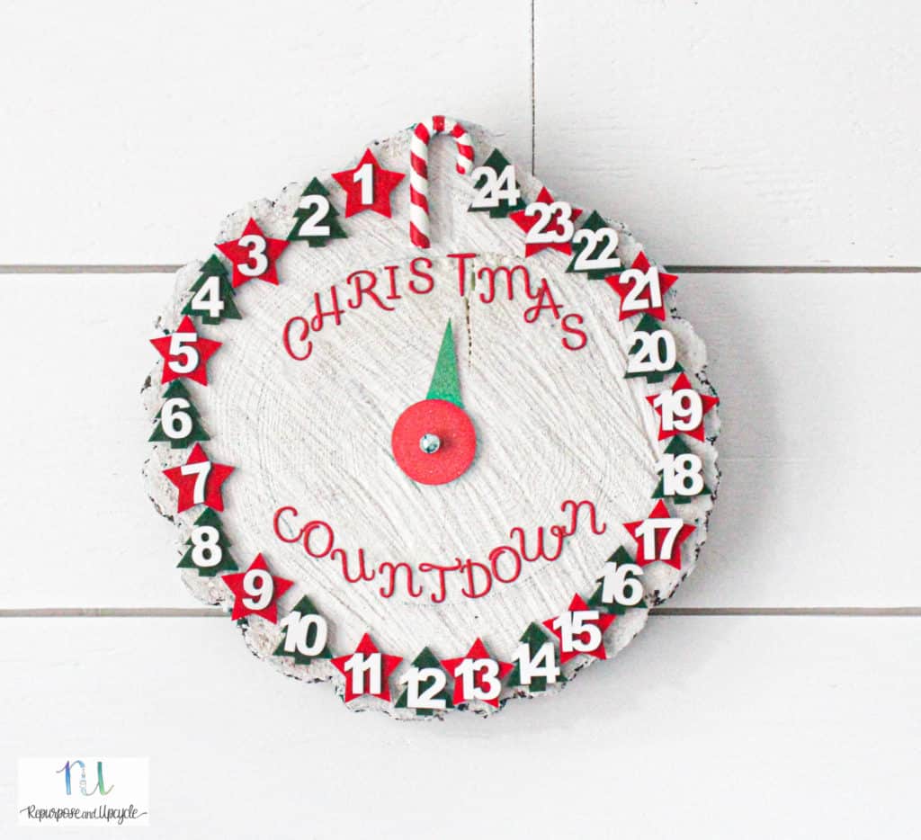 A handmade wooden Christmas countdown clock features numbers 1โ24 around the edge, with red and green accents, and โChristmas Countdownโ in red letters. A red-and-green arrow points to the days left. advent calendar ideas for adults