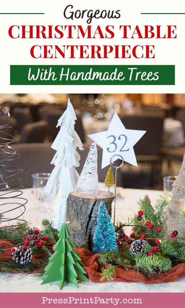 A festive Christmas table centerpiece features handmade christmas tree table decorations, greenery, red berries, pinecones, and a white star with the number 32, all arranged on a wooden log slice.
