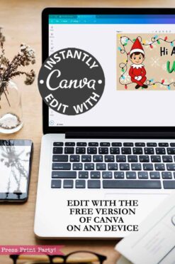 A laptop with a Canva workspace showing the Elf Arrival Banners Printable (Girl and Boy) beside a plant and smartphone. Text: