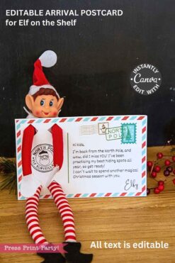 An Elf Arrival Postcard Printable Prop, decorated with North Pole graphics and a festive message, sits among holiday decor—pinecones, red berries, and Elf on the Shelf breakfast cereal—with a plush elf doll in front.