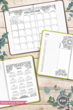 A flat lay of the 2026 Calendar Set & Habit Tracker—printable pages featuring a December monthly calendar, year-at-a-glance, and weekly planner with watercolor florals—surrounded by eucalyptus leaves. "Instant PDF Download" badge shown.