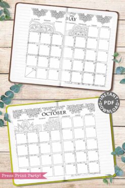 The 2026 Calendar Set & Habit Tracker features watercolor floral designs atop each page, shown open to May and October, displayed on wood with green leaves and a pink