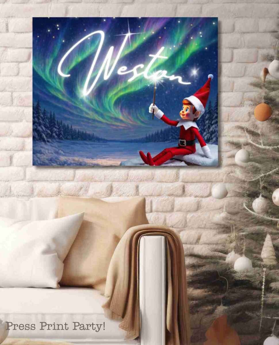 A festive living room with a white brick wall displays a holiday-themed canvas featuring an elf in a Santa hat, alongside printable Elf on the Shelf props. A decorated Christmas tree and cozy sofa are in the foreground.