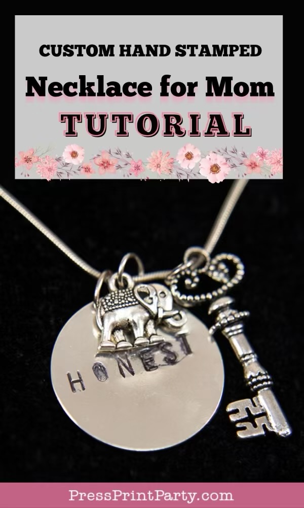 Close-up of a custom hand-stamped necklace with a round pendant stamped "HONEST," a small elephant charm, and an ornate key charm. Text above reads: "Custom Hand Stamped Necklace for Mom Tutorial.