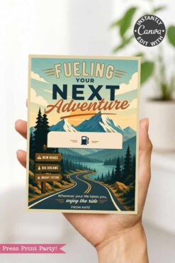 A hand holds the Gas Gift Card Holder Printable - Mountain, featuring a scenic mountain landscape and winding road with "Fueling Your Next Adventure," inspiring phrases, and a blank space for your gift card.