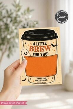 A hand displays one of the 7 Vintage Halloween Gift Card Holders, featuring a charming ghost, bats, coffee cup design, and the playful message “A Little Brew For You!” This creative card holder includes a festive note: “Thank you for all you do! From the Browns.”.