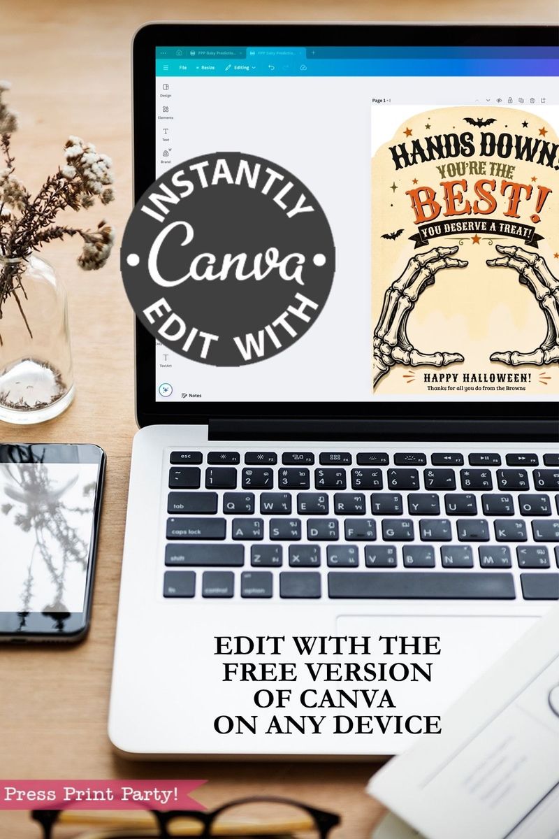 A laptop on a desk displays a Canva design featuring the “7 Vintage Halloween Gift Card Holders,” perfect for creating your own Halloween card holders. Overlay text promotes editing with the free version of Canva. A plant, notebook, and glasses are arranged nearby.