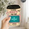 A hand holds one of the 7 Vintage Halloween Gift Card Holders—a coffee cup-shaped card with “A Little Brew For You!” on the front and a convenient slot for a gift card. Reminiscent of whimsical Halloween designs, this holder features a cute dog, pink accents, and “Thank you for all you do!” in smaller text at the bottom.