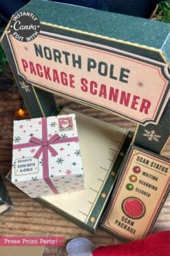 A toy package scanner labeled “North Pole Package Scanner” scans a festively wrapped gift box decorated with 6 Pink Coquette Halloween Ghost Round Labels. The scanner is equipped with buttons and a scan status display, while the package sports a cheerful “Deliver to Good Boys & Girls” label.