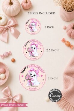 Six Pink Coquette Halloween Ghost round labels, featuring an adorable ghost with a pink bow and flowers, are displayed in 2″, 2.5″, and 3″ sizes on a light pink background adorned with pumpkins, ribbons, and cozy decor—perfect for adding a charming touch to your festive celebrations.